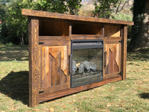 Rustic reclaimed barnwood fireplace TV stand with storage handmade by Uinta Rustics